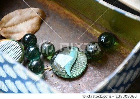 Colorful marbles and paper towels Colorful marbles and paper towels 139309366