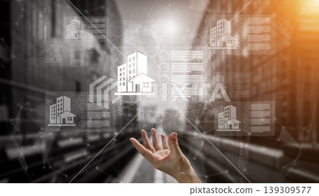 Digital Real Estate Concept with Hand Reaching for Virtual Buildings and Data Graphs in Urban Environment Illustrating Innovative Technology and Future Gantry Digital Real Estate Concept with Hand Reaching for Virtual Buildings and Data Graphs in Urban Environment Illustrating Innovative Technology and Future Gantry 139309577