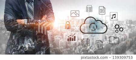 Businessman in Suit Overlooking City with Cloud Computing Icons Representing Data Management, Security, and File Sharing in Background Gantry Businessman in Suit Overlooking City with Cloud Computing Icons Representing Data Management, Security, and File Sharing in Background Gantry 139309753