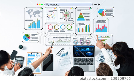 Business Team Collaborating on Data Analysis with Charts, Graphs, and Technology in Modern Office Environment Quark Business Team Collaborating on Data Analysis with Charts, Graphs, and Technology in Modern Office Environment Quark 139309795