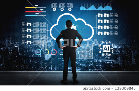 Business Professional Analyzing Data and Cloud Security Solutions with Artificial Intelligence Technology Over City Background at Night Gantry Business Professional Analyzing Data and Cloud Security Solutions with Artificial Intelligence Technology Over City Background at Night Gantry 139309843