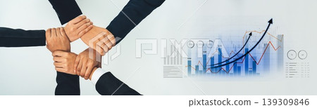Diverse Hands Forming Unity Symbol Over Business Graphs Showing Growth and Success in Collaborative Teamwork and Partnership for Corporate Strategy Scalp Diverse Hands Forming Unity Symbol Over Business Graphs Showing Growth and Success in Collaborative Teamwork and Partnership for Corporate Strategy Scalp 139309846