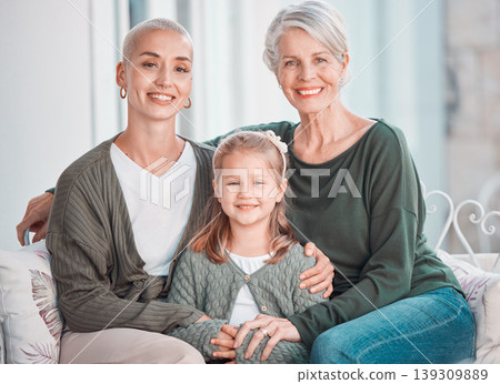 Mother, grandmother and daughter on sofa, portrait and hug with love, care and bonding in lounge at family house. Mama, grandma and girl child with embrace, relax and together on living room couch Mother, grandmother and daughter on sofa, portrait and hug with love, care and bonding in lounge at family house. Mama, grandma and girl child with embrace, relax and together on living room couch 139309889