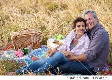 Old couple, relax and portrait of picnic in park for a date with love, care or support in marriage. Happy, man and woman on grass with food, flowers and celebration in retirement, holiday or vacation Old couple, relax and portrait of picnic in park for a date with love, care or support in marriage. Happy, man and woman on grass with food, flowers and celebration in retirement, holiday or vacation 139309960
