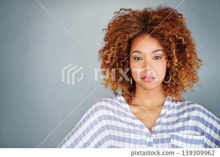 Portrait, confident and creative business woman isolated on a gray background mockup space. Serious face, professional and designer, entrepreneur or young employee at startup office in South Africa Portrait, confident and creative business woman isolated on a gray background mockup space. Serious face, professional and designer, entrepreneur or young employee at startup office in South Africa 139309962