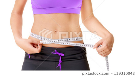 Weight loss, woman or measuring tape with stomach in studio for fitness, wellness or body progress or diet. Person, belly or waist with target for exercise, training or workout on white background Weight loss, woman or measuring tape with stomach in studio for fitness, wellness or body progress or diet. Person, belly or waist with target for exercise, training or workout on white background 139310048
