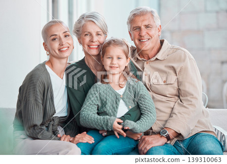 Grandparents, girl and mother in portrait on sofa with hug, care or bonding with love in family home lounge. Elderly people, kid and mom with smile, relax and together on living room couch in house 139310063