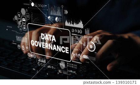 Hands Typing on Keyboard with Data Governance Concept and Digital Graphics for Business Insights and Analysis. Asymptotic smart data analytic 139310171