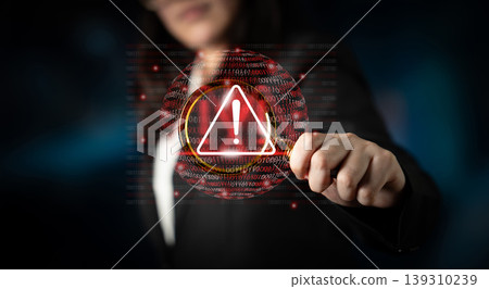 Businesswoman Holding Warning Symbol with Digital Codes in Background for Cybersecurity and Data Protection Concepts in Modern Environment Gantry Businesswoman Holding Warning Symbol with Digital Codes in Background for Cybersecurity and Data Protection Concepts in Modern Environment Gantry 139310239