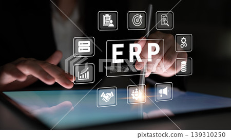 Business Professional Engaging with Digital ERP Icons on Tablet Screen in Dark Environment for Modern Technology Solutions and Innovative Management Strategies Ledger Business Professional Engaging with Digital ERP Icons on Tablet Screen in Dark Environment for Modern Technology Solutions and Innovative Management Strategies Ledger 139310250