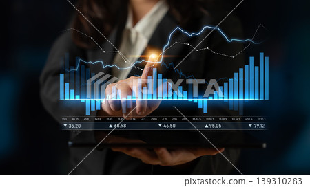 Businesswoman Analyzing Digital Financial Data and Graphs on Tablet Device in Modern Office with Dark Background and Bright Blue Visuals Scalp 139310283
