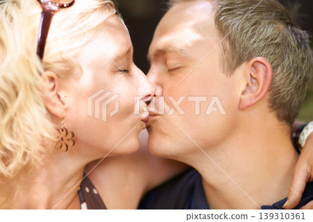 Love, couple and kiss together outdoor, care and healthy relationship, connection or bonding. Lips touch, man and woman in romance, face profile and support, marriage commitment and embrace on date Love, couple and kiss together outdoor, care and healthy relationship, connection or bonding. Lips touch, man and woman in romance, face profile and support, marriage commitment and embrace on date 139310361