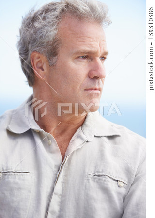 Serious, old man and thinking outdoor in retirement with ideas for health, wellness and mindfulness. Mature, person and planning a decision for future in mockup space with blue sky and background Serious, old man and thinking outdoor in retirement with ideas for health, wellness and mindfulness. Mature, person and planning a decision for future in mockup space with blue sky and background 139310386