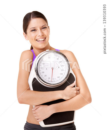 Scale hug, portrait and woman with weight loss goal, success and smile from health progress. Workout, fitness and sport training of a female person in studio with white background and wellness Scale hug, portrait and woman with weight loss goal, success and smile from health progress. Workout, fitness and sport training of a female person in studio with white background and wellness 139310393
