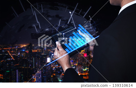Business professional analyzing futuristic data visualization while overlooking a city skyline at night with glowing graphs and charts on a digital tablet Scalp Business professional analyzing futuristic data visualization while overlooking a city skyline at night with glowing graphs and charts on a digital tablet Scalp 139310614