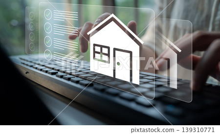 Hands Typing on Keyboard with Digital House Icon and Checklist for Real Estate Management, Home Buying, and Property Investment Processes Gantry 139310771
