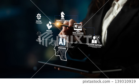 Business strategist analyzing data with artificial intelligence tools for enhanced decision support and effective process management in a corporate environment Quark Business strategist analyzing data with artificial intelligence tools for enhanced decision support and effective process management in a corporate environment Quark 139310919