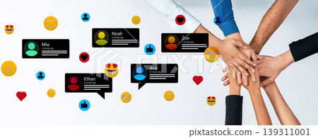 Diverse Group of Hands Together with Social Media Interaction Icons and Bright Emoticons Symbolizing Team Collaboration and Communication in Modern Business Environment Ledger Diverse Group of Hands Together with Social Media Interaction Icons and Bright Emoticons Symbolizing Team Collaboration and Communication in Modern Business Environment Ledger 139311001