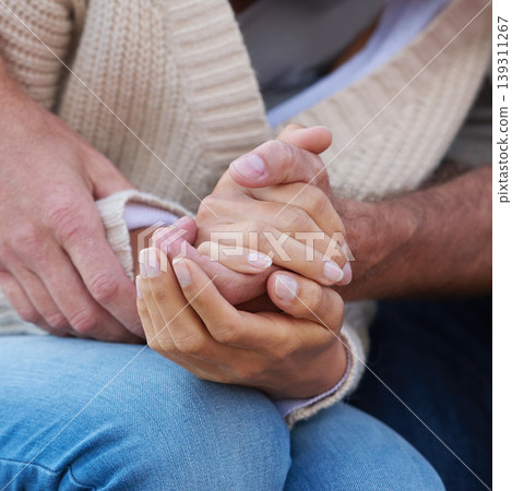 Couple, holding hands and closeup with love, care and support with empathy for illness, diagnosis or cancer. Solidarity, man and woman with gratitude, respect or comfort partner in crisis of health Couple, holding hands and closeup with love, care and support with empathy for illness, diagnosis or cancer. Solidarity, man and woman with gratitude, respect or comfort partner in crisis of health 139311267