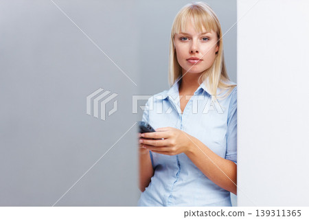 Businesswoman, smartphone and portrait in studio for corporate career with social media in mockup. Person, pride and face with cellphone and start up consultant with technology by gray background 139311365