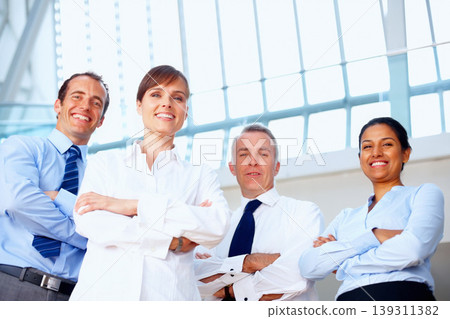 Happy business people, portrait and professional team in confidence at office for leadership or management. Group of executive employees smile with arms crossed in teamwork or mission at workplace 139311382