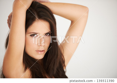 Portrait, beauty and woman with skincare in studio, natural body and facial with haircare with aesthetic wellness spa. Model, face and confident for dermatology, glow and relax by white background 139311390