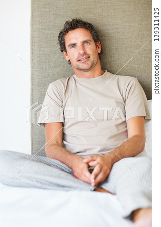 Portrait, mature man and relax bed in the morning after nap, break and awake from comfortable sleep at home. Happy guy wake up in bedroom for healthy rest, routine or cozy day in pajamas in apartment Portrait, mature man and relax bed in the morning after nap, break and awake from comfortable sleep at home. Happy guy wake up in bedroom for healthy rest, routine or cozy day in pajamas in apartment 139311425