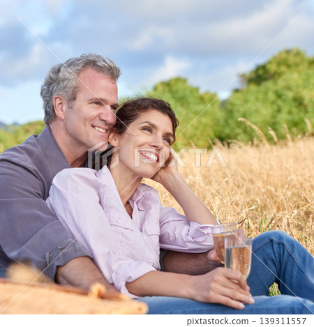 Senior couple, relax and picnic in park, grass and drink in nature for a date in retirement with love or care. Mature, woman and man in field in summer, holiday or vacation with freedom and wine Senior couple, relax and picnic in park, grass and drink in nature for a date in retirement with love or care. Mature, woman and man in field in summer, holiday or vacation with freedom and wine 139311557