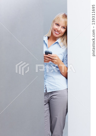 Businesswoman, thinking and smartphone in studio for corporate career with technology in mockup. Young person, idea and cellphone as professional consultant with online website with gray background Businesswoman, thinking and smartphone in studio for corporate career with technology in mockup. Young person, idea and cellphone as professional consultant with online website with gray background 139311695