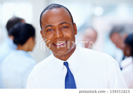 Happy, meeting and portrait of business black man with team for collaboration, leadership and management. Corporate worker, company and face of boss for professional career, job and work in office Happy, meeting and portrait of business black man with team for collaboration, leadership and management. Corporate worker, company and face of boss for professional career, job and work in office 139311823