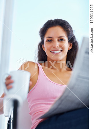 Portrait, smile and woman drinking coffee with newspaper in home, espresso or latte for breakfast to relax in living room in the morning. Face, tea cup and person reading news or info in apartment Portrait, smile and woman drinking coffee with newspaper in home, espresso or latte for breakfast to relax in living room in the morning. Face, tea cup and person reading news or info in apartment 139311925
