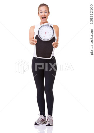 Fitness, scale and portrait of excited woman with smile, workout and wellness with happiness in studio. Health, exercise and body of girl with weight loss measurement isolated on white background. Fitness, scale and portrait of excited woman with smile, workout and wellness with happiness in studio. Health, exercise and body of girl with weight loss measurement isolated on white background. 139312100