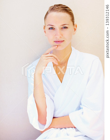 Portrait, skincare and aesthetic with a young woman on a wall background for wellness or natural treatment. Beauty, cosmetics and space with a person at the spa or salon for dermatology or self care Portrait, skincare and aesthetic with a young woman on a wall background for wellness or natural treatment. Beauty, cosmetics and space with a person at the spa or salon for dermatology or self care 139312146