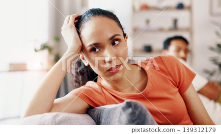 Woman, couple and conflict in home with ignoring, anger or tension with marriage problem. Female person, partner and risk of divorce with relationship dispute, infidelity or separation at house Woman, couple and conflict in home with ignoring, anger or tension with marriage problem. Female person, partner and risk of divorce with relationship dispute, infidelity or separation at house 139312179