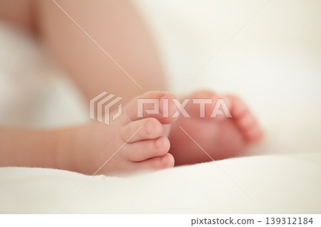 Child, newborn and feet or toes closeup or infant development, safety care or growth support. Baby, foot and soft skin asleep for healthy birth on blanket love or tiny legs or wellness, youth in home 139312184