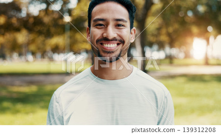 Man, smile and portrait at park for fitness with confidence, pride and outdoor in urban town. Asian person, happy and runner with break in nature, sunshine or ready with wellness in Indonesia 139312208
