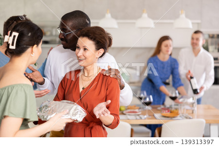 Woman brought pie to her friends Woman brought pie to her friends 139313397