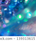 A fantastically shimmering blue light bokeh and an abstract, underwater-like background. 139313615