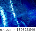 A fantastically shimmering blue light bokeh and an abstract, sparkling background. 139313649
