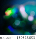 A fantastically shimmering blue light bokeh and an abstract, sparkling background. 139313653
