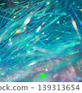 A fantastically shimmering blue light bokeh and an abstract, sparkling background. 139313654