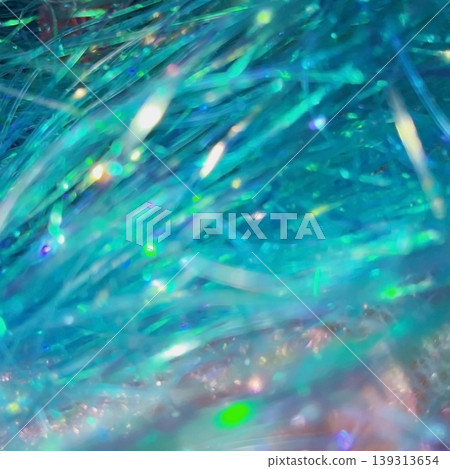 夢幻般閃爍的藍色光暈和抽象的、閃閃發光的背景。 夢幻般閃爍的藍色光暈和抽象的、閃閃發光的背景。 139313654