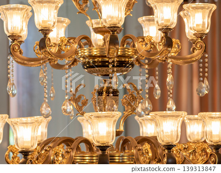 Huge beautiful Ceiling lights illuminated close up Huge beautiful Ceiling lights illuminated close up 139313847