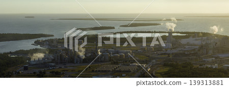 Factory for handling and processing of phosphates emitting toxic vapors polluting air. Mosaic Riverview Plant in Tampa, Florida. Industrial facility for chemical production of phosphoric acid Factory for handling and processing of phosphates emitting toxic vapors polluting air. Mosaic Riverview Plant in Tampa, Florida. Industrial facility for chemical production of phosphoric acid 139313881