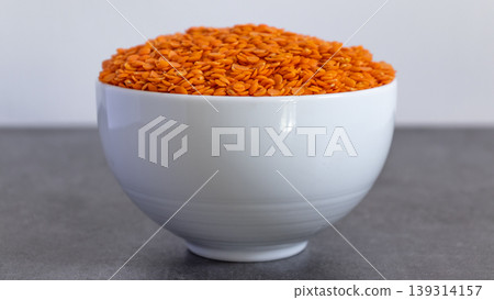 Bowl of Dhal seeds front view Neutral background with negative space to add caption Bowl of Dhal seeds front view Neutral background with negative space to add caption 139314157
