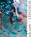 A fantastically shimmering deep blue water surface and an abstract bubble texture background. 139314216