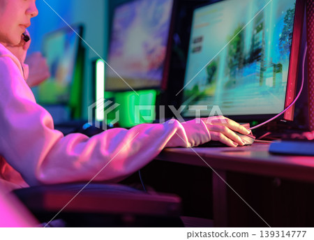 Gamers operate PCs 139314777
