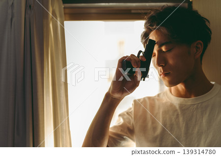 Man, gun, windowsill Man, gun, windowsill 139314780