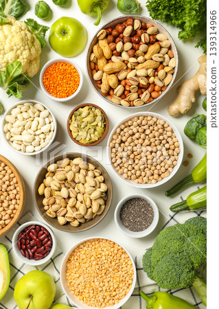 Various fresh ingredients spread on a table ready for cooking 139314966
