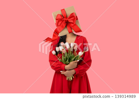 Woman with gift instead head holding bouquet Woman with gift instead head holding bouquet 139314989